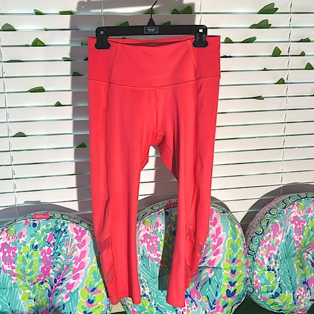 Layers peachy orange Capri yoga pants with sheer hem design